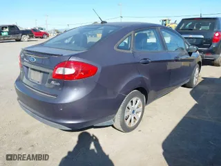 2012 Ford Fiesta SE with VIN 3FADP4BJ6CM123724, listed as a IAAI auction lot 41782133 with 138,126 mi miles. Bid and sale history available at carsss.com. Image 4.