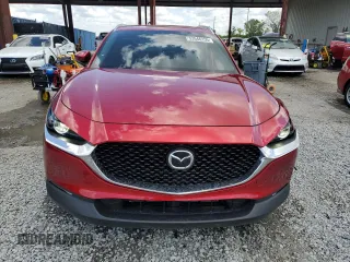 2023 Mazda CX-30 S Carbon Edition с VIN 3MVDMBCM0PM533469, выставлен на аукционе Copart как лот 52646155 с пробегом 22 636 миль миль и На запчасти • Non repairable. История ставок и продаж доступна на DreamBid. Изображение 5.