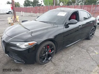 2021 Alfa Romeo Giulia Ti Sport with VIN ZARFAMBN5M7645723, listed as a IAAI auction lot 42057861 with 63,594 mi miles. Bid and sale history available at carsss.com. Image 18.