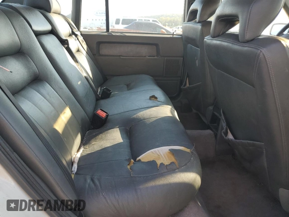 1994 Volvo 900 с VIN YV1JS8611R1172830, выставлен на аукционе Copart как лот 75955284 с пробегом 222 846 миль миль и Списание • Salvage title. История ставок и продаж доступна на DreamBid. Изображение 11.