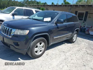 2012 Jeep Grand Cherokee Laredo with VIN 1C4RJEAG9CC223167, listed as a IAAI auction lot 42136098 with 152,715 mi miles. Bid and sale history available at carsss.com. Image 18.