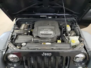 2014 Jeep Wrangler Unlimited Sport with VIN 1C4BJWDG8EL100708, listed as a Copart auction lot 57297245 with 170,862 mi miles and Clean Title. Bid and sale history available at DreamBid. Image 11.