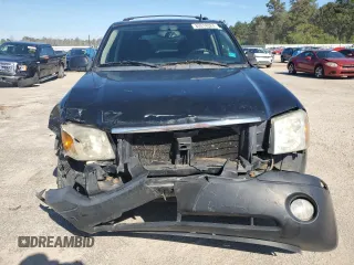 2006 GMC Envoy SLT with VIN 1GKDT13S462359008, listed as a Copart auction lot 80014324 with 158,906 mi miles and Salvage Title. Bid and sale history available at carsss.com. Image 5.