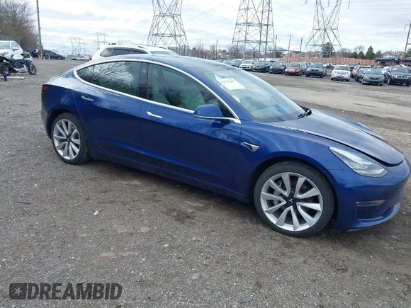 2020 Tesla Model 3 Long Range with VIN 5YJ3E1EB9LF601198, listed as a IAAI auction lot 41744287 with 70,322 mi miles and . Bid and sale history available at DreamBid. Image 1.