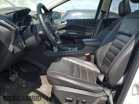 2018 Ford Escape Titanium z VIN 1FMCU9J94JUD09141, wystawiony jako Copart lot #56625805 z przebiegiem Nie podano mil oraz Szkoda całkowita • Salvage title. Historia ofert i sprzedaży dostępna na DreamBid. Obrazek 7.