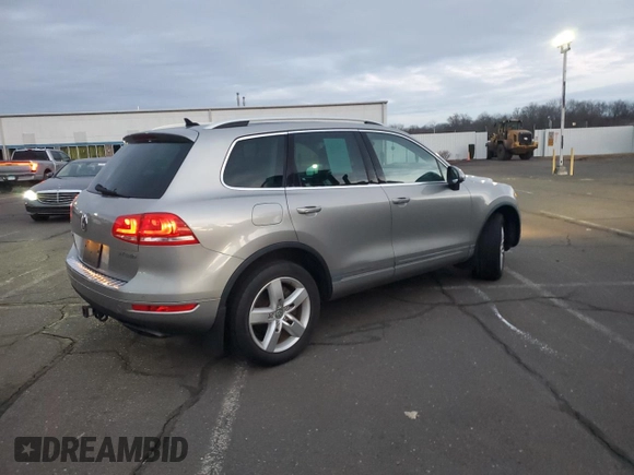 2012 Volkswagen Touareg with VIN WVGFG9BPXCD004442, listed as a Copart auction lot 41466935 with 98,956 mi miles and Clean title. Bid and sale history available at DreamBid. Image 3.