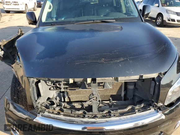 2011 Infiniti QX56 8-passenger with VIN JN8AZ2NC8B9303121, listed as a Copart auction lot 79643554 with 187,950 mi miles and Salvage Title. Bid and sale history available at carsss.com. Image 12.