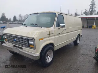 1990 Ford Econoline Cargo with VIN 1FTDE14N0LHA80405, listed as a IAAI auction lot 41824747 with 91,278 mi miles and . Bid and sale history available at DreamBid. Image 2.