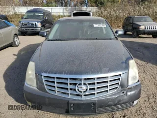 2009 Cadillac DTS 1SC z VIN 1G6KD57Y39U129722, wystawiony jako Copart lot #77071164 z przebiegiem 133 769 mil mil oraz Czysty tytuł • Clean title. Historia ofert i sprzedaży dostępna na DreamBid. Obrazek 5.