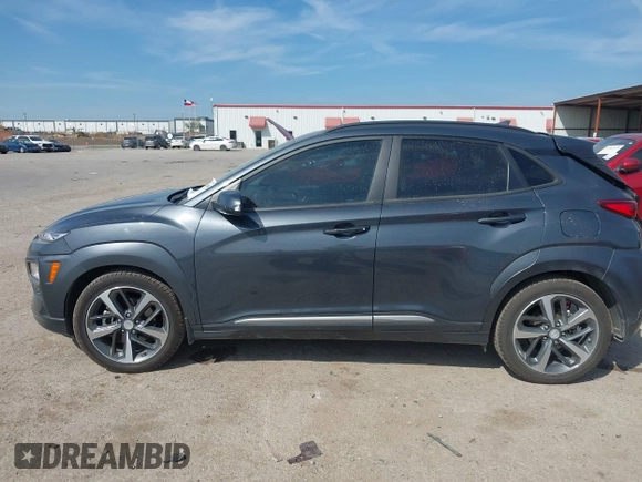 2021 Hyundai Kona Ultimate with VIN KM8K53A50MU601084, listed as a IAAI auction lot 41900099 with 56,171 mi miles. Bid and sale history available at carsss.com. Image 14.