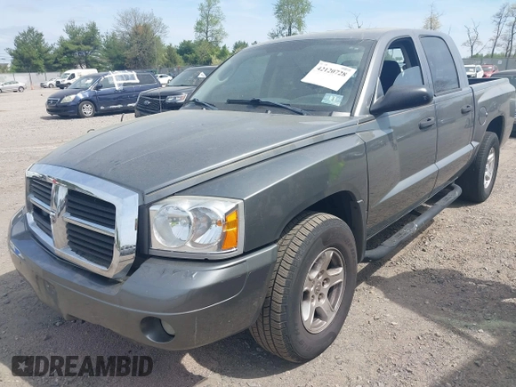 2006 Dodge Dakota SLT with VIN 1D7HE48N06S580705, listed as a IAAI auction lot 42120728 with 206,420 mi miles. Bid and sale history available at carsss.com. Image 2.