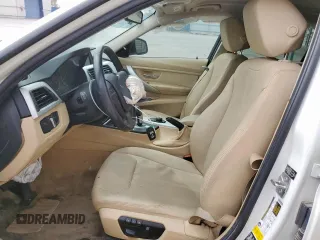 2013 BMW 3 Series 328i xDrive with VIN WBA3B3C51DF540084, listed as a Copart auction lot 56930105 with 117,567 mi miles and Salvage title. Bid and sale history available at DreamBid. Image 7.