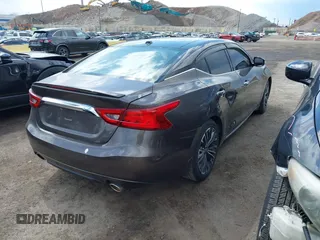 2016 Nissan Maxima SV with VIN 1N4AA6AP0GC904168, listed as a IAAI auction lot 41865822 with 121,999 mi miles and . Bid and sale history available at DreamBid. Image 4.