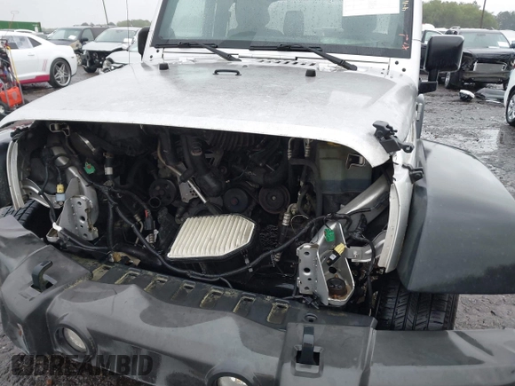 2012 Jeep Wrangler Sport с VIN 1C4AJWAG0CL273538, выставлен на аукционе IAAI как лот 41998975 с пробегом 120 603 миль миль и . История ставок и продаж доступна на DreamBid. Изображение 6.
