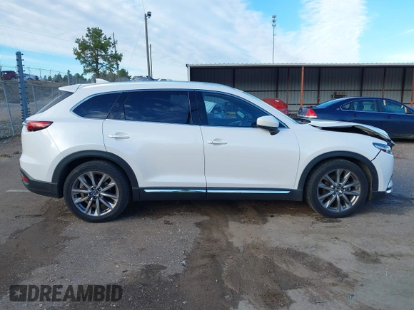 2016 Mazda CX-9 Grand Touring z VIN JM3TCADY4G0124588, wystawiony jako IAAI lot #41192549 z przebiegiem 161 272 mil mil oraz . Historia ofert i sprzedaży dostępna na DreamBid. Obrazek 13.