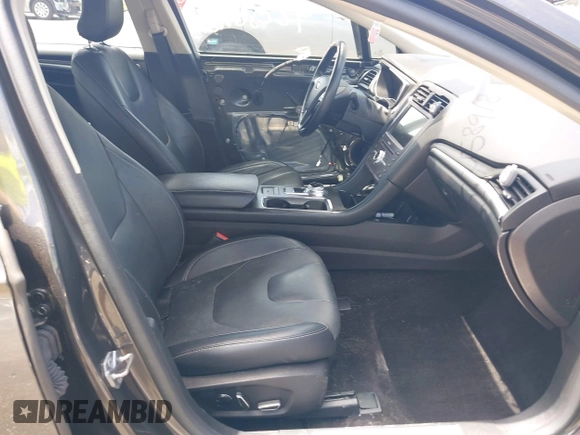 2017 Ford Fusion Titanium z VIN 3FA6P0SUXHR184919, wystawiony jako IAAI lot #42258918 z przebiegiem Nie podano mil oraz . Historia ofert i sprzedaży dostępna na DreamBid. Obrazek 5.