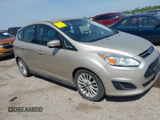 2017 Ford C-Max SE z VIN 1FADP5AU7HL117831, wystawiony jako IAAI lot #42034045 z przebiegiem 124 014 mil mil oraz . Historia ofert i sprzedaży dostępna na DreamBid. Obrazek 1.