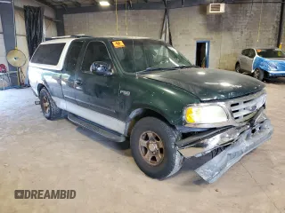 2002 Ford F-150 XL z VIN 1FTRX172X2NA10475, wystawiony jako Copart lot #61645655 z przebiegiem Nie podano mil oraz Szkoda całkowita • Salvage title. Historia ofert i sprzedaży dostępna na DreamBid. Obrazek 4.