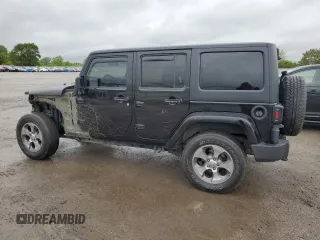 2017 Jeep Wrangler Unlimited Sahara with VIN 1C4BJWEGXHL594203, listed as a Copart auction lot 57359515 with 101,763 mi miles and Salvage title. Bid and sale history available at DreamBid. Image 2.