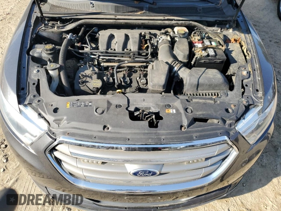 2015 Ford Taurus SE with VIN 1FAHP2D86FG184747, listed as a Copart auction lot 77659254 with 140,404 mi miles and Clean Title. Bid and sale history available at carsss.com. Image 11.