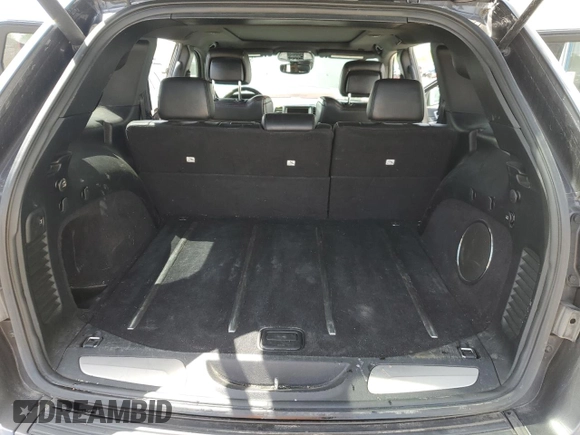 2017 Jeep Grand Cherokee Trailhawk with VIN 1C4RJFLGXHC654112, listed as a Copart auction lot 56397195 with 168,136 mi miles and Salvage title. Bid and sale history available at DreamBid. Image 6.
