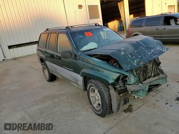 1997 Jeep Grand Cherokee TSi with VIN 1J4FX58SXVC565347, listed as a Copart auction lot 80953334 with 355,373 mi miles and Salvage Title. Bid and sale history available at carsss.com. Image 11.