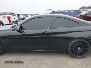 2019 BMW M4 with VIN WBS4Y9C53KAH82910, listed as a IAAI auction lot 41570315 with 59,227 mi miles. Bid and sale history available at carsss.com. Image 15.