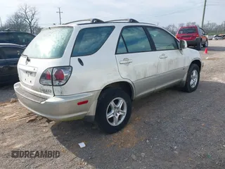 2003 Lexus RX 300 z VIN JTJGF10U730154745, wystawiony jako IAAI lot #41915670 z przebiegiem 174 314 mil mil oraz . Historia ofert i sprzedaży dostępna na DreamBid. Obrazek 4.