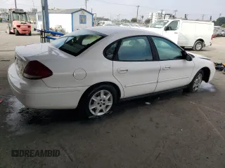 2006 Ford Taurus SE with VIN 1FAHP53U86A237001, listed as a Copart auction lot 62858785 with 133,697 mi miles and Salvage title. Bid and sale history available at DreamBid. Image 3.