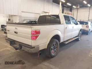 2011 Ford F-150 XLT with VIN 1FTFW1ET5BFB03495, listed as a IAAI auction lot 41525106 with 147,273 mi miles. Bid and sale history available at carsss.com. Image 4.