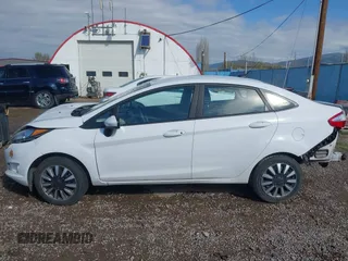 2018 Ford Fiesta S z VIN 3FADP4AJ2JM136775, wystawiony jako IAAI lot #42136725 z przebiegiem 47 072 mil mil oraz . Historia ofert i sprzedaży dostępna na DreamBid. Obrazek 15.