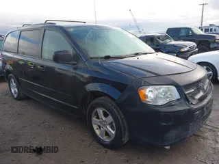 2012 Dodge Grand Caravan SXT with VIN 2C4RDGCG3CR318900, listed as a IAAI auction lot 41145958 with 201,117 mi miles and . Bid and sale history available at DreamBid. Image 1.