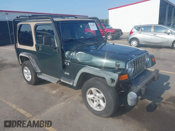 2002 Jeep Wrangler X with VIN 1J4FA39S72P733034, listed as a IAAI auction lot 42659447 with 200,786 mi miles and . Bid and sale history available at DreamBid. Image 1.
