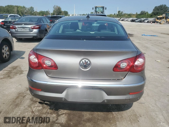 2009 Volkswagen CC Luxury with VIN WVWHL73C19E514531, listed as a Copart auction lot 71124304 with 120,483 mi miles and Salvage Title. Bid and sale history available at DreamBid. Image 6.