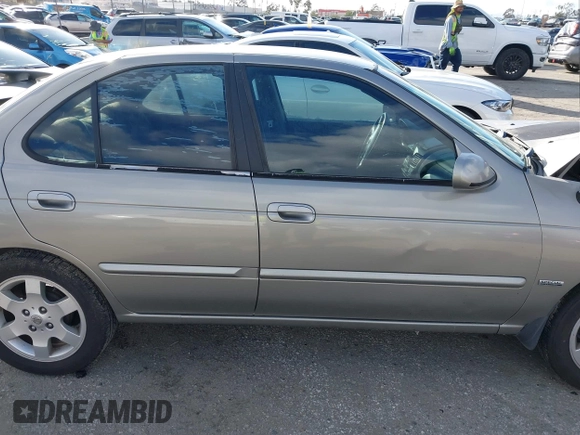 2006 Nissan Sentra S z VIN 3N1CB51D56L514396, wystawiony jako IAAI lot #41591034 z przebiegiem 350 322 mil mil oraz . Historia ofert i sprzedaży dostępna na DreamBid. Obrazek 14.