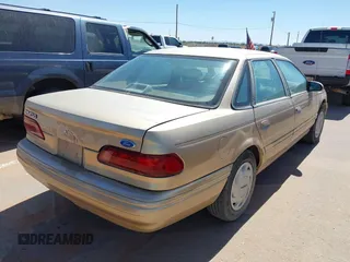 1994 Ford Taurus GL z VIN 1FALP52U9RG209348, wystawiony jako IAAI lot #42418772 z przebiegiem 81 838 mil mil oraz . Historia ofert i sprzedaży dostępna na DreamBid. Obrazek 4.