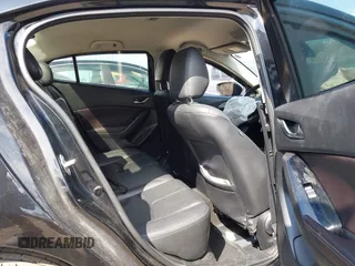 2018 Mazda 3 Touring with VIN 3MZBN1V34JM261565, listed as a IAAI auction lot 41795238 with 121,112 mi miles. Bid and sale history available at carsss.com. Image 8.