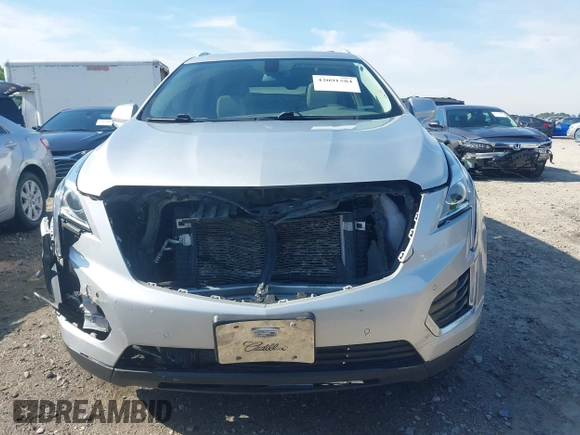 2017 Cadillac XT5 Luxury FWD z VIN 1GYKNBRS3HZ223077, wystawiony jako IAAI lot #42091584 z przebiegiem 154 664 mil mil oraz . Historia ofert i sprzedaży dostępna na DreamBid. Obrazek 12.
