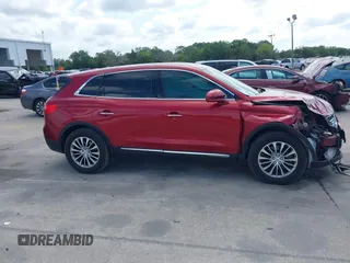2016 Lincoln MKX Select z VIN 2LMTJ6KR3GBL55200, wystawiony jako IAAI lot #42091854 z przebiegiem 74 426 mil mil oraz . Historia ofert i sprzedaży dostępna na DreamBid. Obrazek 13.