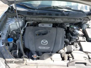 2016 Mazda CX-5 Touring z VIN JM3KE4CY4G0646114, wystawiony jako IAAI lot #42269181 z przebiegiem 58 252 mil mil oraz . Historia ofert i sprzedaży dostępna na DreamBid. Obrazek 10.