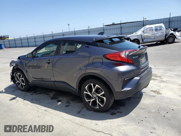 2021 Toyota C-HR LE with VIN JTNKHMBX1M1115317, listed as a Copart auction lot 56200305 with 82,237 mi miles and Clean Title. Bid and sale history available at DreamBid. Image 2.