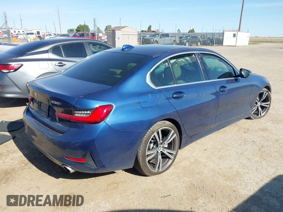 2021 BMW 3 Series 330i z VIN 3MW5R1J03M8B71429, wystawiony jako IAAI lot #42290683 z przebiegiem Nie podano mil oraz . Historia ofert i sprzedaży dostępna na DreamBid. Obrazek 4.