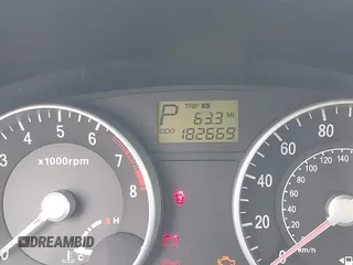 2006 Hyundai Accent GLS z VIN KMHCN46C66U058232, wystawiony jako IAAI lot #41899629 z przebiegiem 182 669 mil mil oraz . Historia ofert i sprzedaży dostępna na DreamBid. Obrazek 15.
