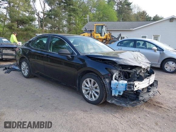 2020 Toyota Camry LE with VIN 4T1C11AK2LU393699, listed as a IAAI auction lot 42123267 with 66,932 mi miles and . Bid and sale history available at carsss.com. Image 1.