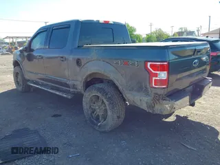 2018 Ford F-150 XL with VIN 1FTEW1EG1JFC91543, listed as a IAAI auction lot 42307775 with 102,055 mi miles and . Bid and sale history available at DreamBid. Image 3.