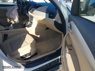 2015 BMW X1 xDrive28i with VIN WBAVL1C50FVY26009, listed as a IAAI auction lot 41495667 with 109,807 mi miles. Bid and sale history available at carsss.com. Image 5.