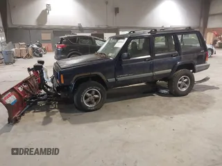 1999 Jeep Cherokee Sport with VIN 1J4FF68S2XL602709, listed as a IAAI auction lot 41177232 with Not Provided miles. Bid and sale history available at carsss.com. Image 2.