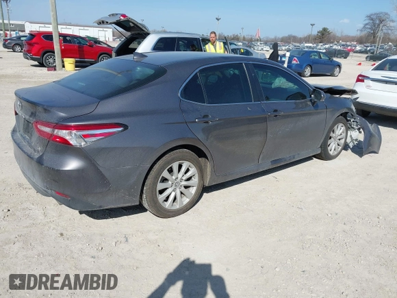 2019 Toyota Camry LE with VIN 4T1B11HK9KU810347, listed as a IAAI auction lot 41804007 with 75,063 mi miles and . Bid and sale history available at DreamBid. Image 4.