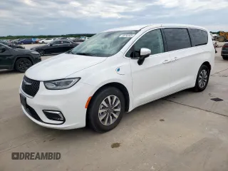 2023 Chrysler Pacifica Hybrid Touring L z VIN 2C4RC1L77PR540944, wystawiony jako Copart lot #58792825 z przebiegiem 68 228 mil mil oraz Czysty tytuł • Clean title. Historia ofert i sprzedaży dostępna na DreamBid. Obrazek 1.