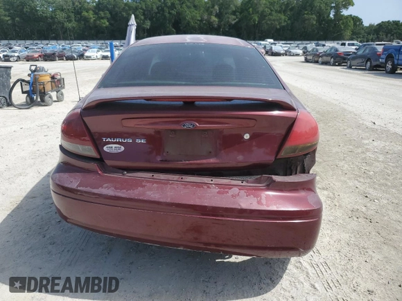 2007 Ford Taurus SE with VIN 1FAFP53U17A151246, listed as a Copart auction lot 60221955 with 284,321 mi miles and Salvage title. Bid and sale history available at DreamBid. Image 6.